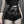 Woman wearing the PU Leather Goth Shorts with fishnets, front view, studded belt, pentagram rings and chains