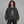 Puzzle Face Graphic Y2K Hoodie – worn by a woman