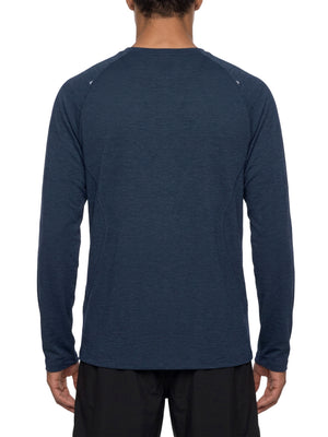Navy Blue raglan long sleeve gym shirt seen from the back on a model, curved seams across the shoulders