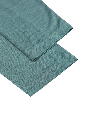 Close-up of the Teal Green long sleeve cuffs, showing the heathered knit and stitched sleeve hem