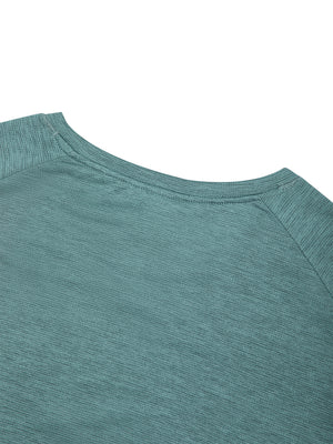 Close-up of the crew neck and raglan shoulder seam on the Teal Green long sleeve gym shirt