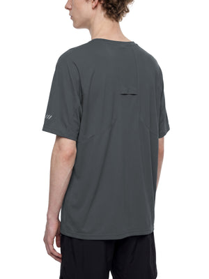 Back three-quarter view of the Dark Gray raglan tee on a model, showing the sleeve reflective stripes