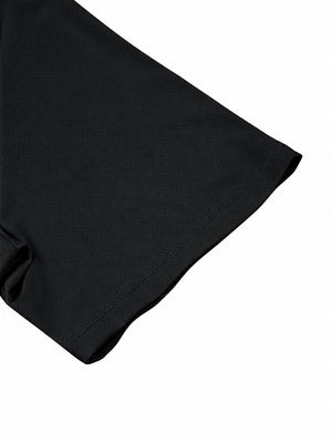 Detail of the short sleeve hem on the black reflective trim gym tee, clean double stitched edge