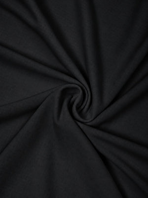 Swirl of the black polyester fabric used for the reflective trim gym T-shirt, smooth knit surface