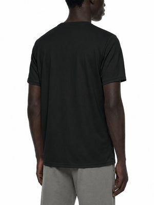 Back three-quarter view of the black reflective trim gym T-shirt on a model, slim straight fit