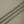 Close-up of the Gray Green viscose, cotton and spandex jersey in soft folds, fine knit surface