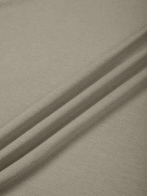 Close-up of the Gray Green viscose, cotton and spandex jersey in soft folds, fine knit surface
