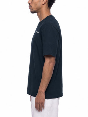Side profile of the Gray Blue regular fit tee on a model, showing the set-in short sleeve and straight hem
