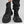Retro PU leather techwear boots, close-up on stitching and grain