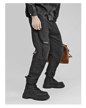 Retro PU leather techwear boots worn with dark trousers, styling shot
