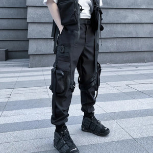 Black ribbon buckle techwear pants with an elastic waist