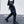 Black ribbon buckle techwear pants with an elastic waist