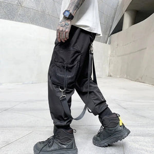 Pantalon noir à poches multiples avec patchwork de rubans