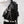 Black tactical techwear backpack with ribbon detailing, 20 to 35 litres