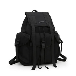 Black tactical techwear backpack with ribbon detailing, 20 to 35 litres