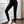 Black high-waisted ripped techwear leggings for women