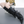 Black PU leather leg warmers with star rivets and buckle straps