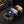 Roman Chain Techwear Ring in rainbow, blue, silver-tone, black and gold-tone finishes side by side