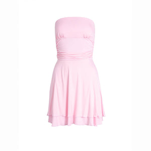 Ruched Bandeau Y2K Dress in pink laid flat on white, showing the ruched bodice and double-layer hem