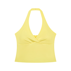 Yellow ruched halter yoga tank top laid flat, front view with the twist at the bust and a plunging V neck