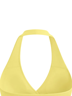 Close-up of the yellow halter strap and the open back edge of the ruched yoga tank top