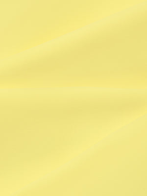 Close-up of the smooth yellow stretch fabric of the ruched halter yoga tank top