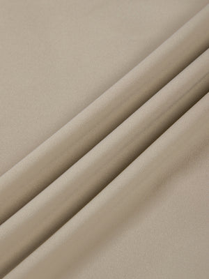 Folds of the Khaki nylon and spandex fabric, a smooth matte stretch knit used for the whole bodysuit