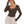 Model touching her hair in the Coffee scoop neck bodysuit, front view with one hand in her sweatpants pocket