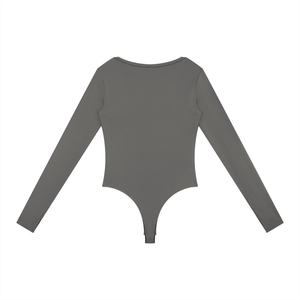 Back of the Gray bodysuit laid flat, smooth plain back with long sleeves and a narrow bottom panel