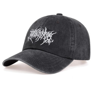 Black baseball cap with jagged white script embroidery on the front