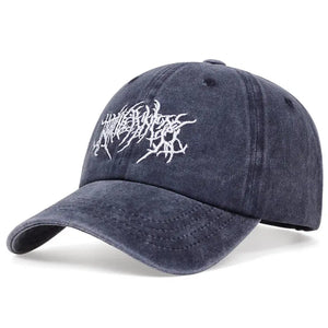 Black baseball cap with jagged white script embroidery on the front