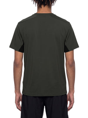 Back view of the Dark Gray side panel t-shirt on a model, black panels under both arms