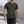 Dark Gray side panel running t-shirt worn front walking view, black panels under the arms