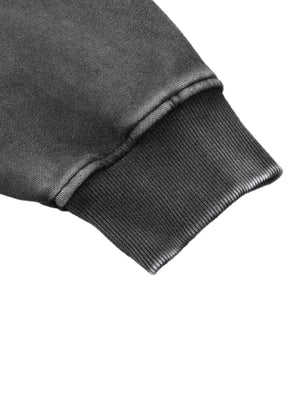 Ribbed cuff at the end of the long sleeve of the Skull Hoodie Y2K Washed Black in snow-washed grey
