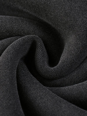 Swirled fabric close-up of the Skull Hoodie Y2K Washed Black, smooth knitted face of the heavy fleece