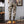 Back view of the khaki camo cargo pants, showing the back flap pockets and elastic ankle cuffs