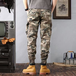 Back view of the khaki camo cargo pants, showing the back flap pockets and elastic ankle cuffs