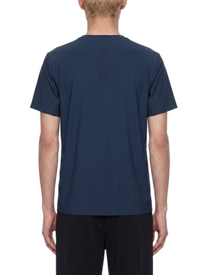 Back view of the Navy Blue slim fit t-shirt on a model, tonal arrow print running down the spine