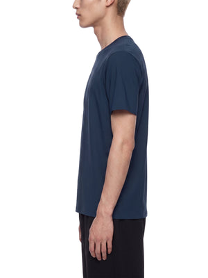 Side view of the Navy Blue slim fit gym t-shirt on a model, showing the close fit and sleeve length