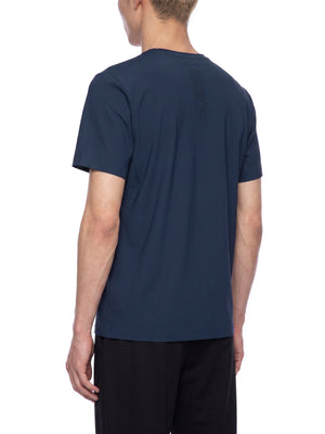 Navy Blue gym t-shirt in a back three-quarter view on a model, tonal arrow print down the back