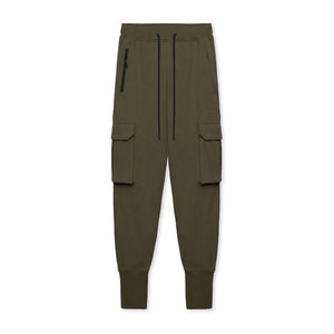 Army Green slim cargo joggers laid out from the front, zipped hip pocket, low flap pockets and ribbed ankle cuffs