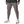Dark Gray Slim Fit Techwear Joggers on a man in a dark top, front view of the tapered leg and white running shoes