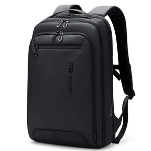 Slim black backpack with a 15.6 inch laptop sleeve and a flat front profile