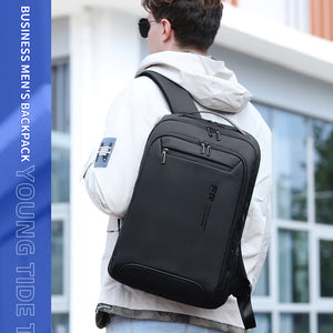Slim black backpack with a 15.6 inch laptop sleeve and a flat front profile