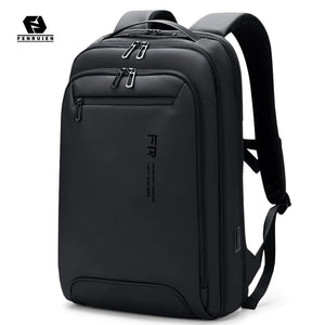 Slim black backpack with a 15.6 inch laptop sleeve and a flat front profile