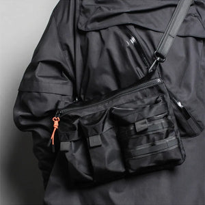 Black and army green slim messenger techwear bag in nylon