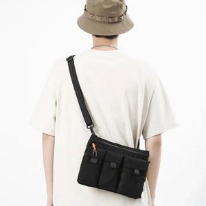 Black and army green slim messenger techwear bag in nylon