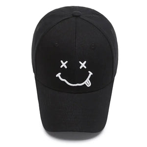 Baseball cap with a smile face embroidery and adjustable strap