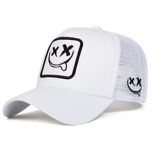 White trucker cap with an XX smiley face patch and mesh back