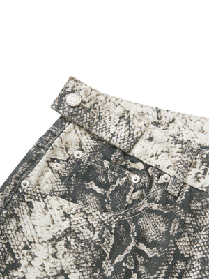 The fly opened to show the button placket and the reverse of the woven cotton behind it